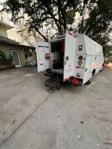 Magnet Plumbing service vehicle on-site for Grease Trap Cleaning in Wilshire Park